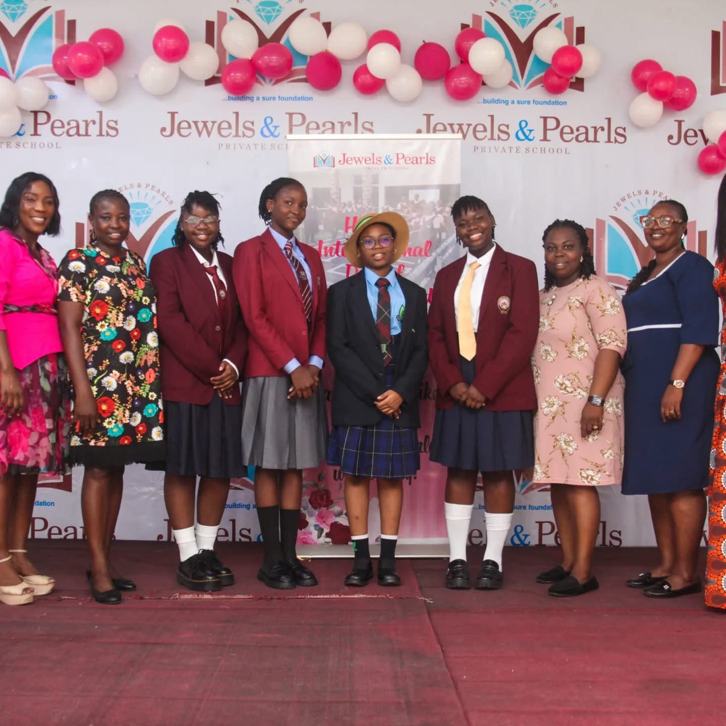 Students and staff celebrating International Day at Jewels and Pearls Private School